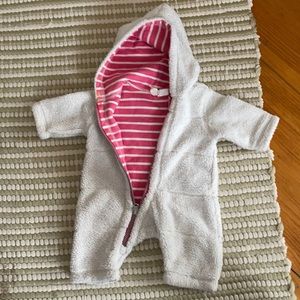 Soft, snuggly baby onesie for wear outdoors.